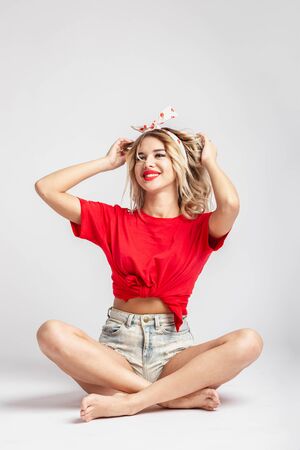 Blonde ass and legs in short tight shorts
